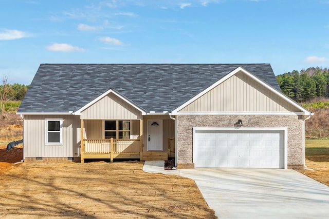 view of front facade with covered porch and a garage