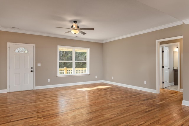 unfurnished living room with light wood-type flooring, ceiling fan, and ornamental molding