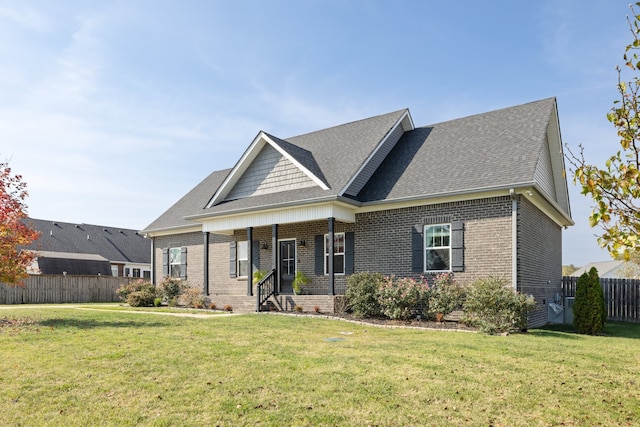 craftsman-style house with a front yard