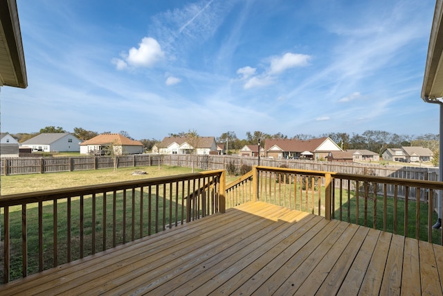 wooden deck with a yard