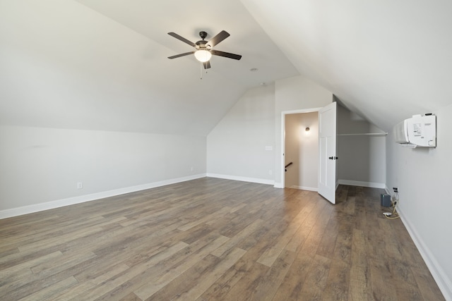 bonus room with vaulted ceiling, hardwood / wood-style flooring, and ceiling fan