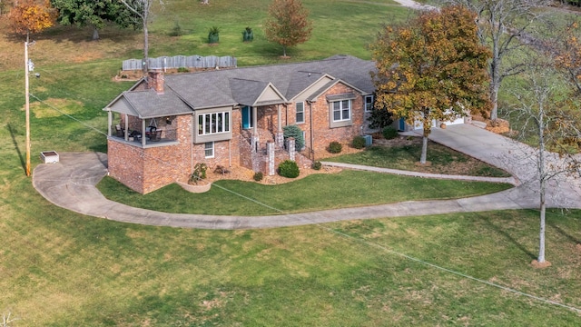 view of front facade featuring a garage and a front yard