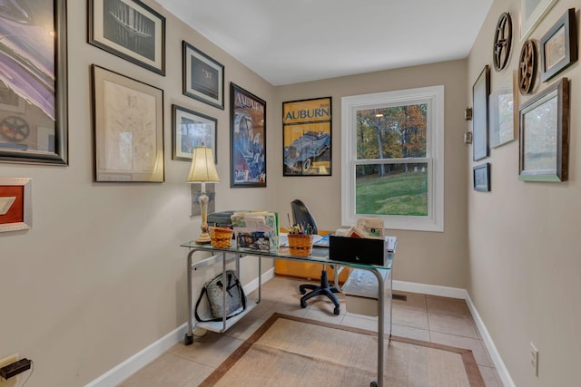 office area with light tile patterned floors