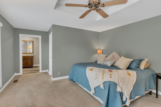 bedroom with ceiling fan and light colored carpet