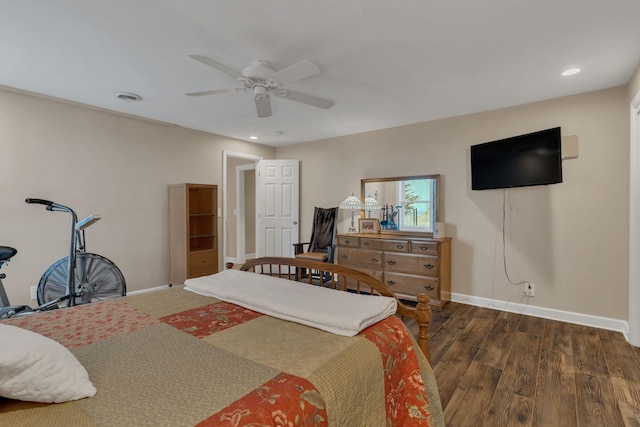 bedroom with ceiling fan and dark hardwood / wood-style flooring