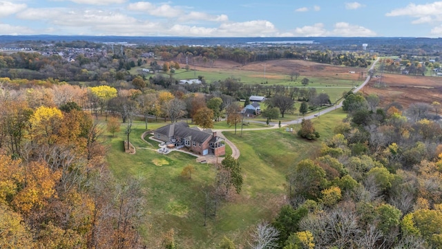 birds eye view of property featuring a rural view