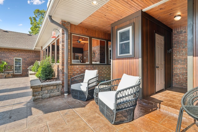 view of patio with a porch and ceiling fan