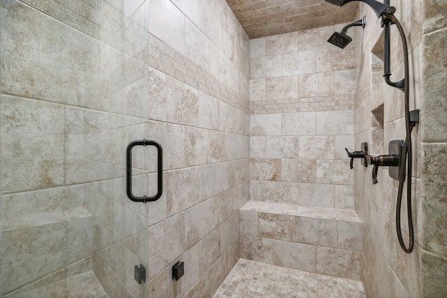 bathroom featuring an enclosed shower