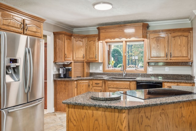 kitchen with black appliances, crown molding, dark stone counters, a textured ceiling, and sink