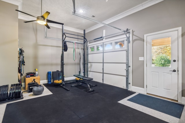 workout area with ceiling fan, a textured ceiling, and crown molding