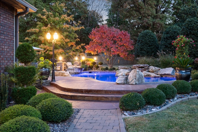 view of pool featuring a patio area