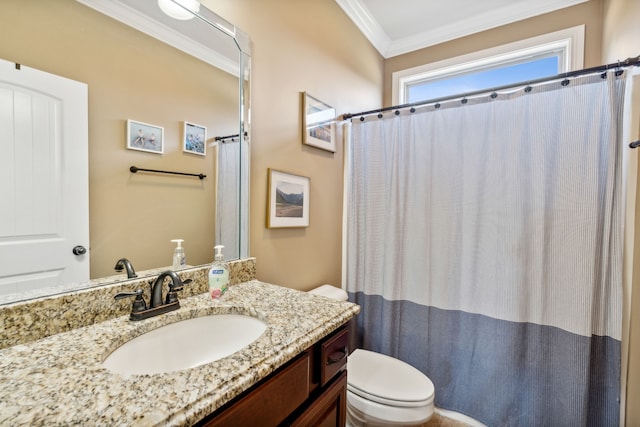 bathroom with vanity, curtained shower, ornamental molding, and toilet