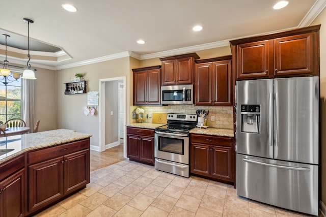 kitchen featuring tasteful backsplash, appliances with stainless steel finishes, light stone countertops, ornamental molding, and pendant lighting