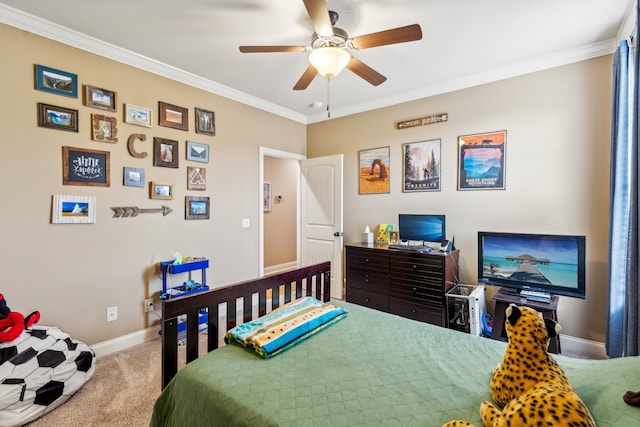 carpeted bedroom featuring ceiling fan and ornamental molding