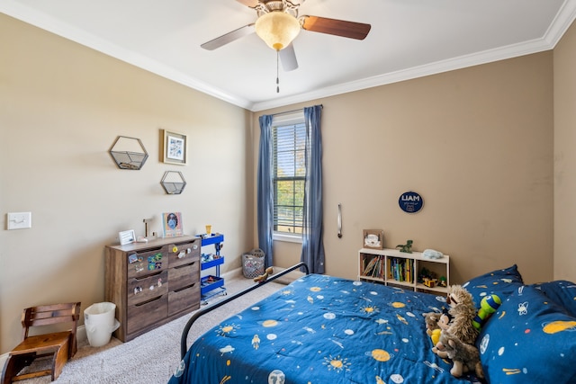 bedroom featuring ceiling fan, crown molding, and carpet flooring