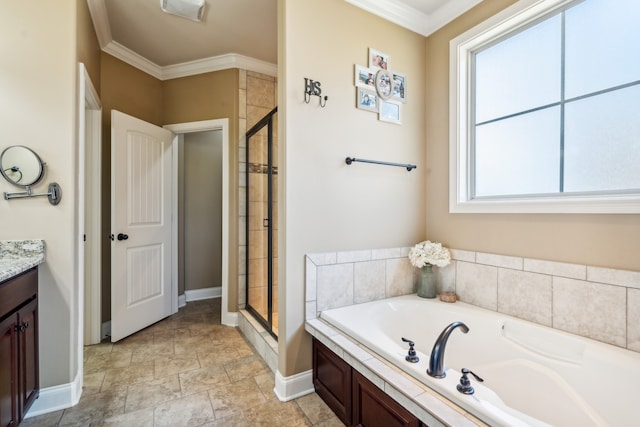 bathroom featuring vanity, ornamental molding, shower with separate bathtub, and plenty of natural light