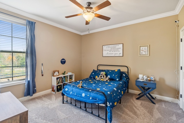 carpeted bedroom with ceiling fan and ornamental molding