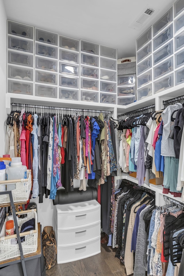 spacious closet featuring hardwood / wood-style floors