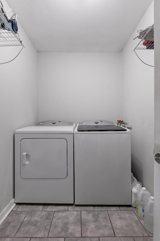 washroom featuring washer and dryer