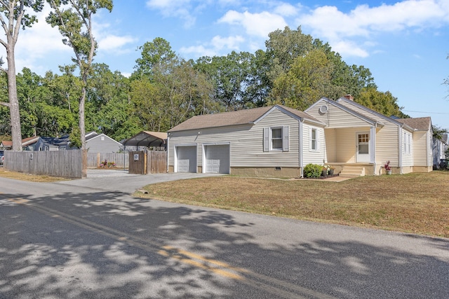 view of front facade with a front lawn and a garage