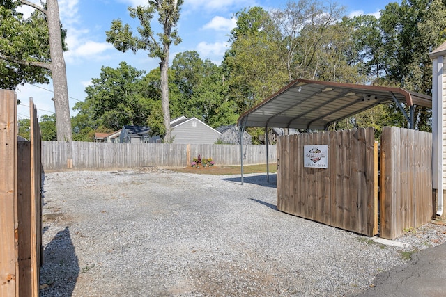 exterior space featuring a carport