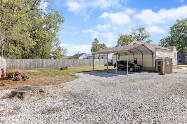 view of parking / parking lot with a carport