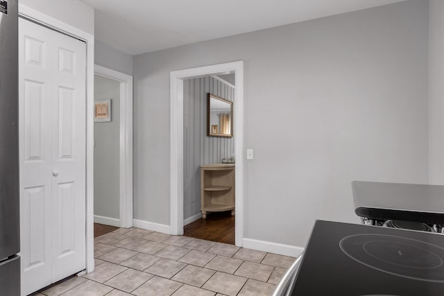 interior space featuring light tile patterned floors