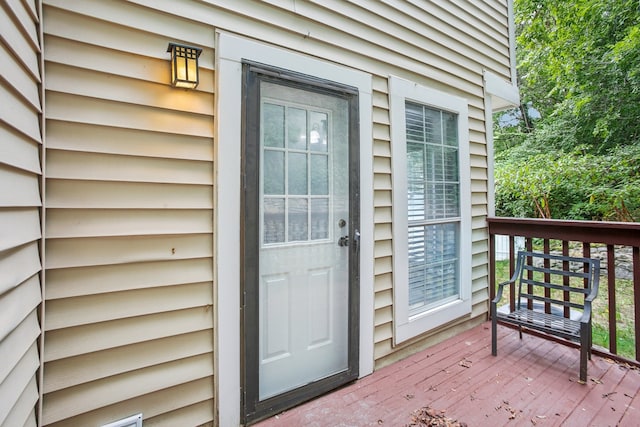 doorway to property with a wooden deck