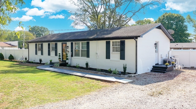 single story home with a front yard