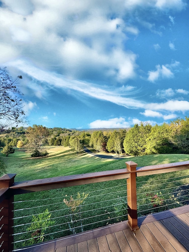 wooden deck with a yard