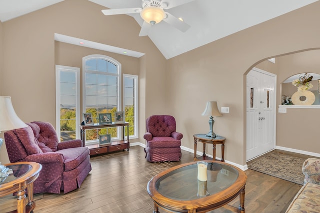 sitting room featuring hardwood / wood-style floors, ceiling fan, and vaulted ceiling