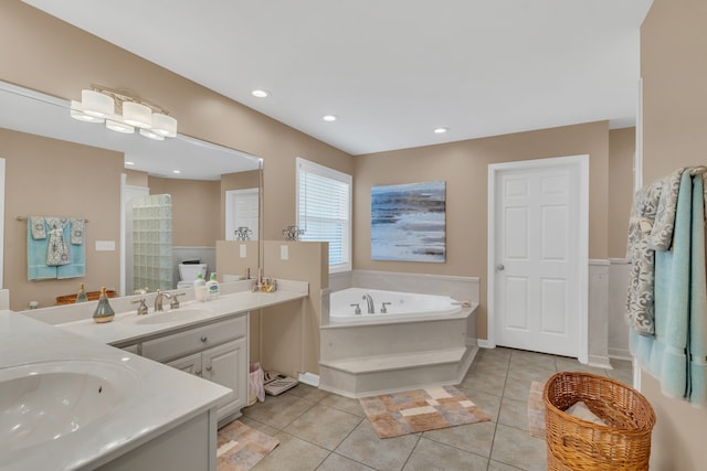 bathroom with vanity, tile patterned flooring, and plus walk in shower