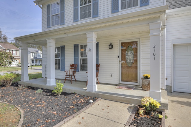 doorway to property featuring a porch