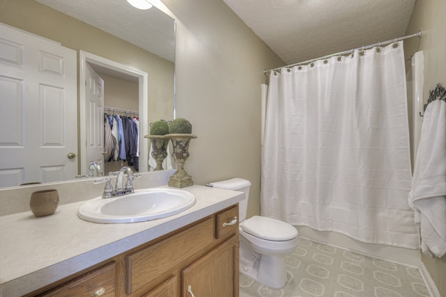 full bathroom with vanity, shower / bath combination with curtain, a textured ceiling, and toilet