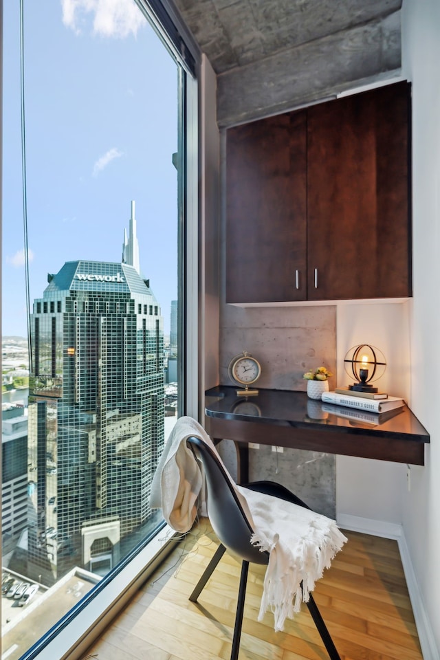 home office featuring hardwood / wood-style floors