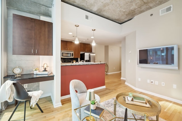 living room featuring light hardwood / wood-style floors