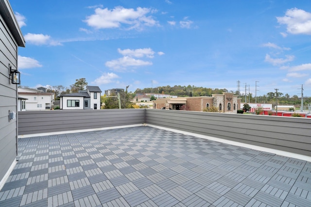 view of patio featuring a balcony