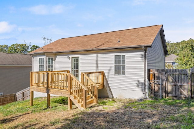 rear view of house with a deck