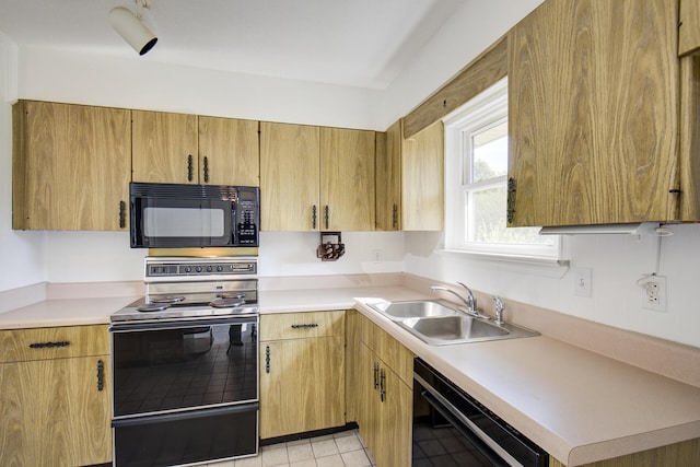 kitchen featuring black appliances and sink