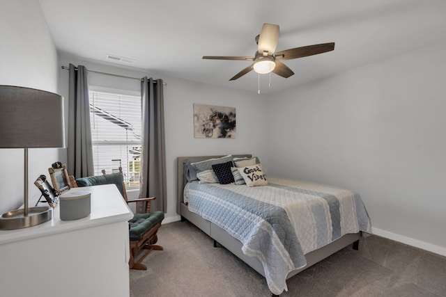 bedroom with ceiling fan and carpet floors