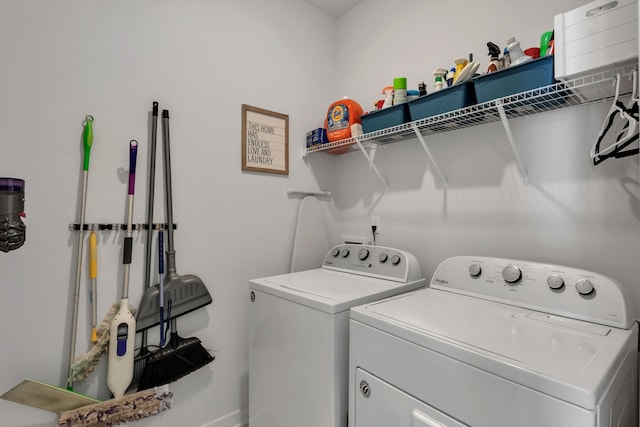 laundry area with washing machine and clothes dryer