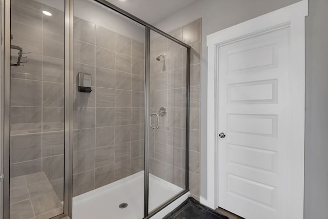 bathroom with an enclosed shower