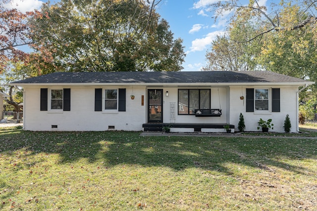 single story home featuring a front yard