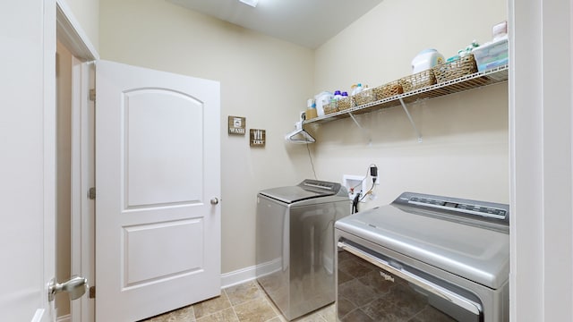 washroom with washing machine and dryer