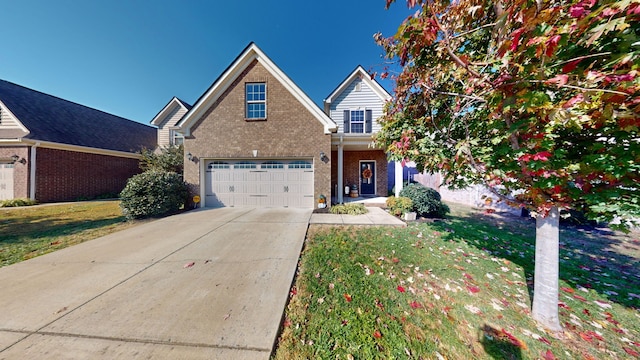 view of front of property with a garage and a front lawn