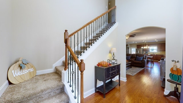 stairway with wood-type flooring