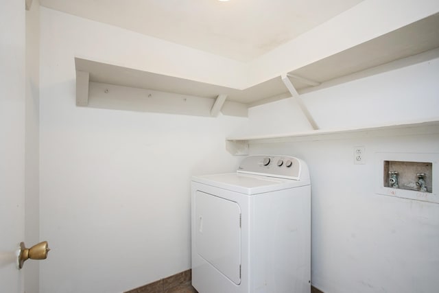 washroom with washer / clothes dryer