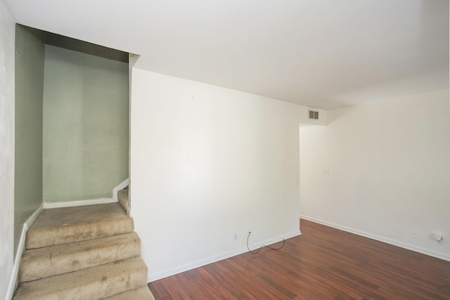 interior space with dark hardwood / wood-style flooring