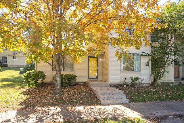 view of front of home with a front yard