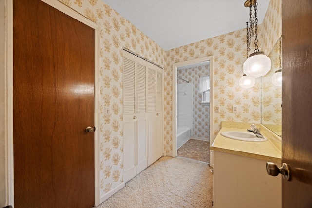 bathroom featuring vanity and shower / bathtub combination